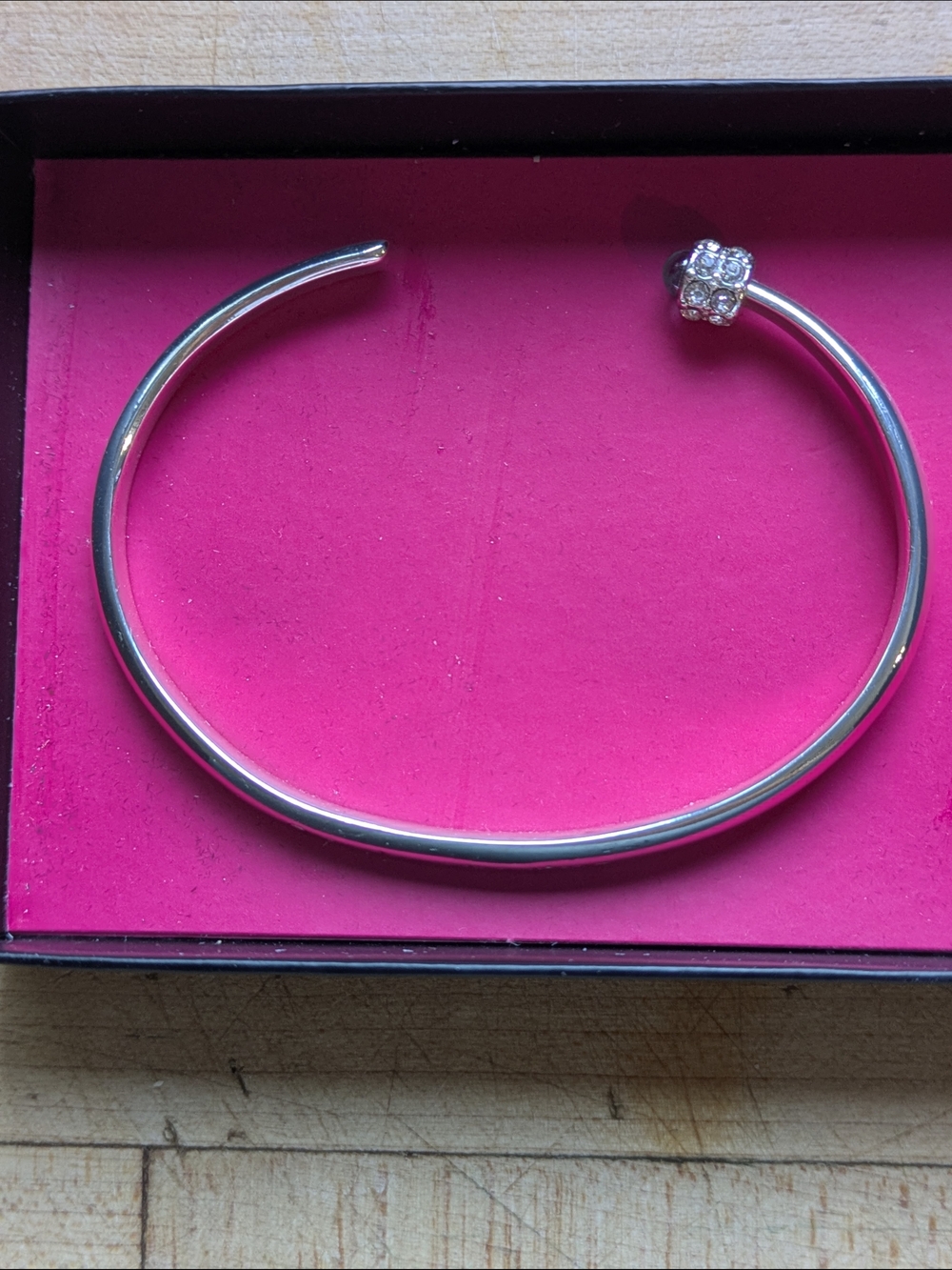 Avon Silver Tone Bangle with Crystal Accent